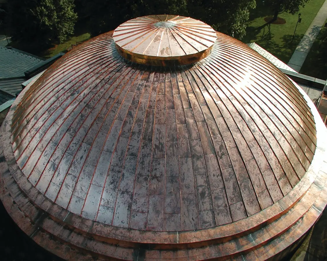 Craftsman Roofing crew installing a new roof in Garden City Park